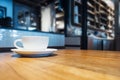 Coffee cup on table in cafe shop interior