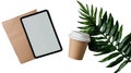 Coffee cup, tablet, and notebook on transparent background with tropical leaf accents Royalty Free Stock Photo