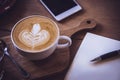 Coffee cup and tasty cake on wood table and Blank paper waiting Royalty Free Stock Photo