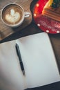 Coffee cup and tasty cake on wood table and Blank paper waiting Royalty Free Stock Photo