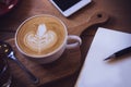 Coffee cup and tasty cake on wood table and Blank paper waiting Royalty Free Stock Photo