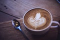 Coffee cup and tasty cake on wood table and Blank paper waiting Royalty Free Stock Photo