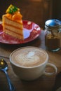 Coffee cup and tasty cake on wood table and Blank paper waiting Royalty Free Stock Photo