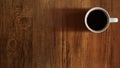 Coffee cup top view on wooden table background Royalty Free Stock Photo