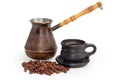 Coffee in cup, vintage copper coffee pot and coffee beans Royalty Free Stock Photo