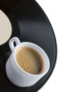 Coffee-cup on vinyl record Royalty Free Stock Photo