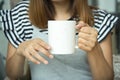 Coffee cup in woman hand