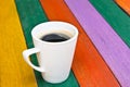 Coffee cup on wood colorful