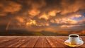 Coffee cup on wood table and view of beautiful nature background Royalty Free Stock Photo