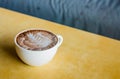 Coffee cup on a wooden table Royalty Free Stock Photo