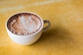Coffee cup on a wooden table Royalty Free Stock Photo