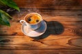 COFFEE CUP ON A WOODEN TABLE