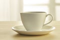 Coffee cup on wooden table Royalty Free Stock Photo