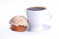 Coffee with a cupcake with sprinkles Royalty Free Stock Photo