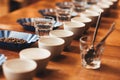 Coffee cups and beans on table ready for a tasting