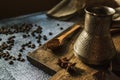 Coffee, dark chocolate and spices on a brown wooden board 1