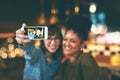 Coffee date with my bestie. two young friends taking a selfie together in a cafe. Royalty Free Stock Photo