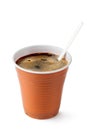 Coffee in disposable cup with plastic spoon Royalty Free Stock Photo