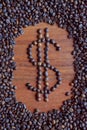 Roasted coffee dollar logo on the table Royalty Free Stock Photo