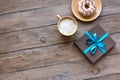 Coffee, donut and gift box