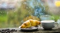Coffee drink with croissant dessert. Enjoying coffee on rainy day. Coffee time on rainy day. Fresh brewed coffee in Royalty Free Stock Photo