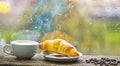 Coffee drink with croissant dessert. Enjoying coffee on rainy day. Coffee time on rainy day. Fresh brewed coffee in Royalty Free Stock Photo