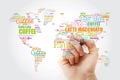 Coffee drinks word cloud in shape of World Map Royalty Free Stock Photo