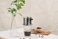 Coffee dripping in vietnamese style on wooden table Royalty Free Stock Photo