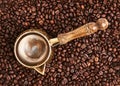 Coffee dzhezva on a background of coffee beans Royalty Free Stock Photo