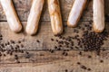 Coffee eclairs over wood Royalty Free Stock Photo
