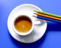 Coffee espresso cup  on blue background Royalty Free Stock Photo