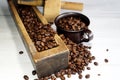 Coffee in espressocup and a grinder   on a wooden board Royalty Free Stock Photo