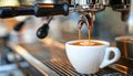 Coffee extraction portafilter pouring coffee into cup from machine in bright white setting Royalty Free Stock Photo