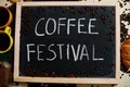 Coffee festival. Words on blackboard flat lay