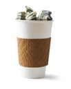 Coffee filled with cash Royalty Free Stock Photo