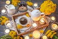 Coffee, flowers and candles on the table. rural still life Royalty Free Stock Photo