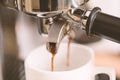 Coffee flowing into a cup Royalty Free Stock Photo