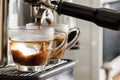 Coffee flowing into the cup Royalty Free Stock Photo