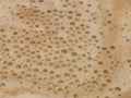 Coffee foam. Coffee foam. Fabstract spotted background Royalty Free Stock Photo