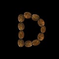 Coffee font alphabet concept isolated on white background. Top view Alphabet made of roasted coffee beans. Letter D