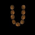 Coffee font alphabet concept isolated on white background. Top view Alphabet made of roasted coffee beans. Letter U