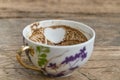 Heart shape in Turkish coffee grounds in cup for fortune telling Royalty Free Stock Photo