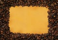 Coffee frame on yellowed paper Royalty Free Stock Photo