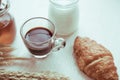 Coffee and fresh breads served for breakfast on wooden trays Royalty Free Stock Photo