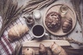 Coffee and fresh breads served for breakfast on wooden trays Royalty Free Stock Photo