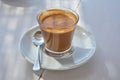 Coffee in glass in outdoor beach cafe