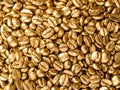 Coffee gold closeup background. Royalty Free Stock Photo