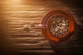 Coffee grains cup saucer on vintage wooden board Royalty Free Stock Photo