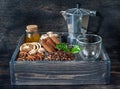 Coffee grains, honey, sugar and spices in a wooden box vintage