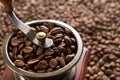 Coffee grinder on a background coffee beans